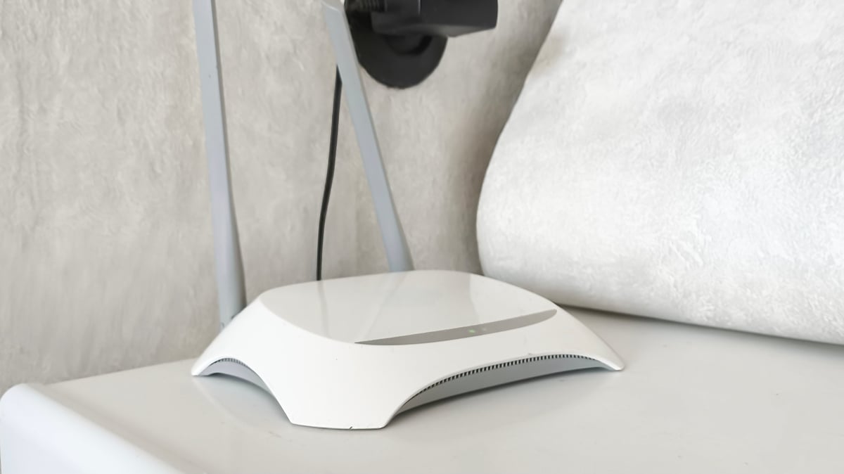 WiFi router setup on shelf