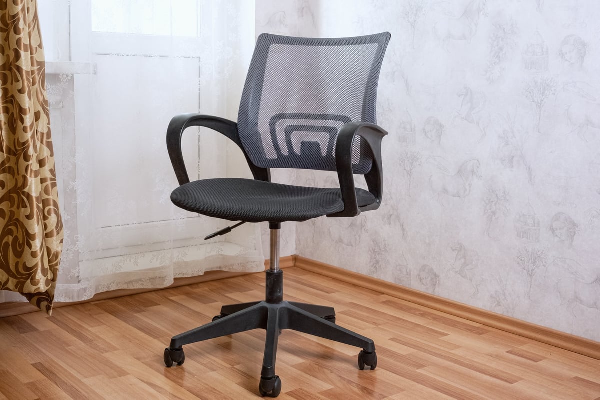 Modern ergonomic mesh office chair in a clean home office setting